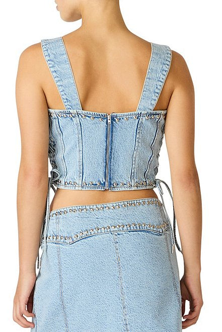 Light blue denim crop top and skirt set on a white background