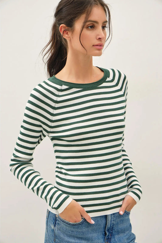 woman in striped sweater and jeans