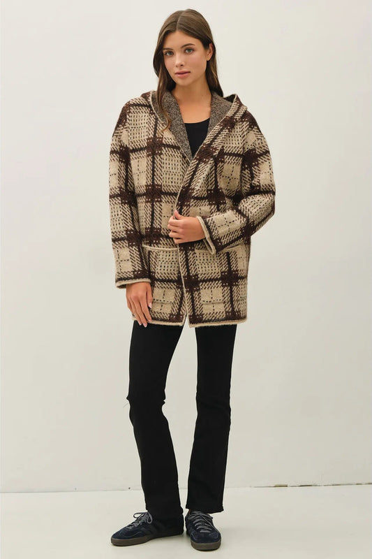woman in plaid coatigan and pants