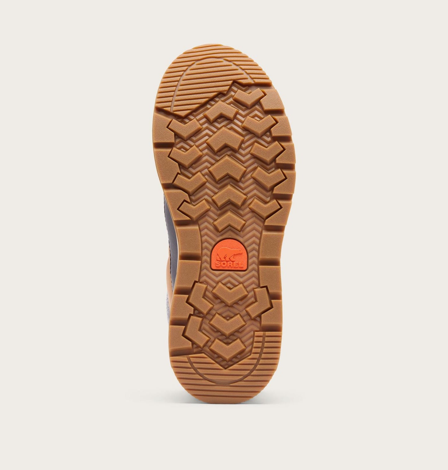 The outsole of a boot shown from a top-down view, featuring a textured brown rubber tread with a bright orange circular logo in the center, set against a light gray background.
