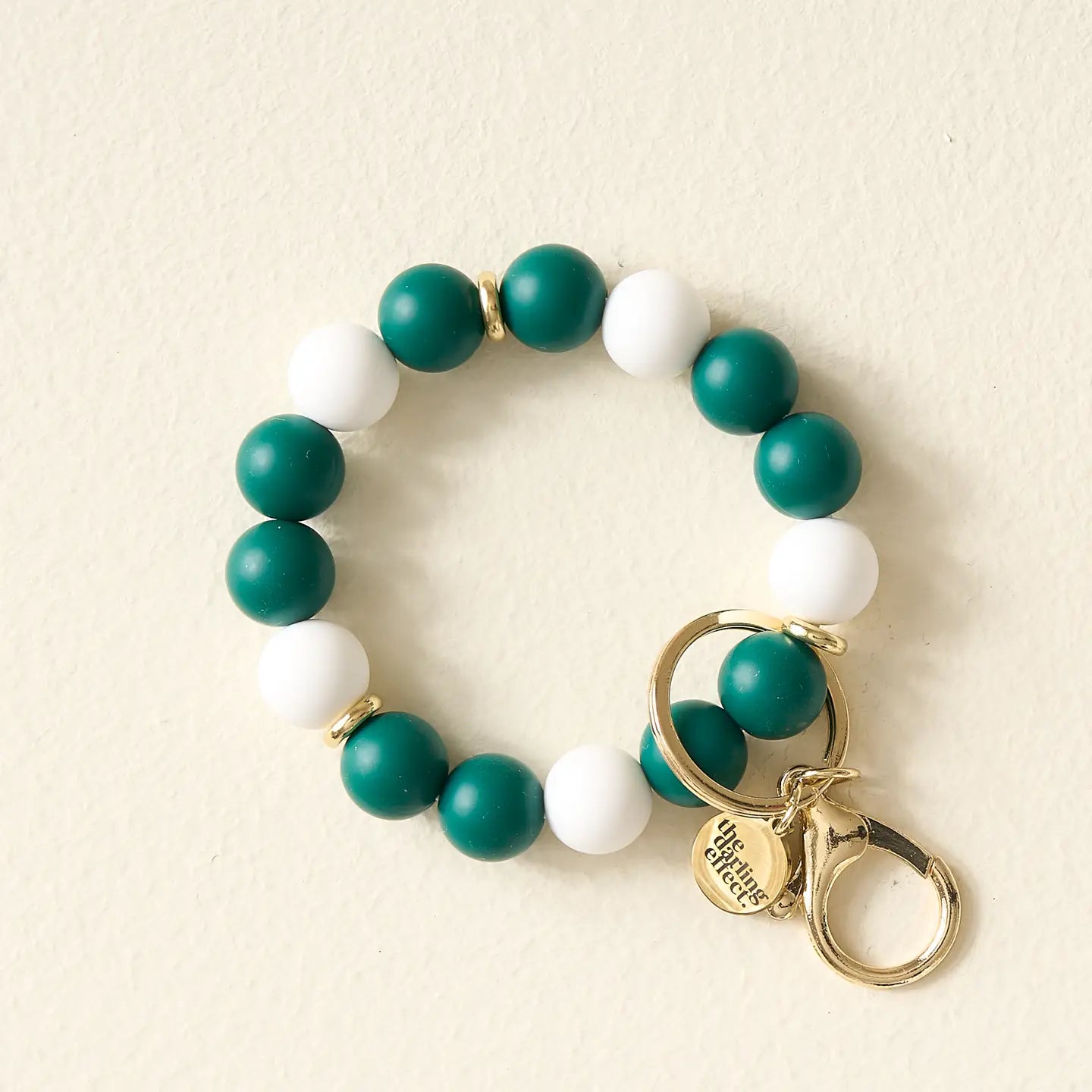 green and white wristlet