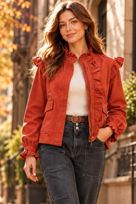 woman in ruffle jacket