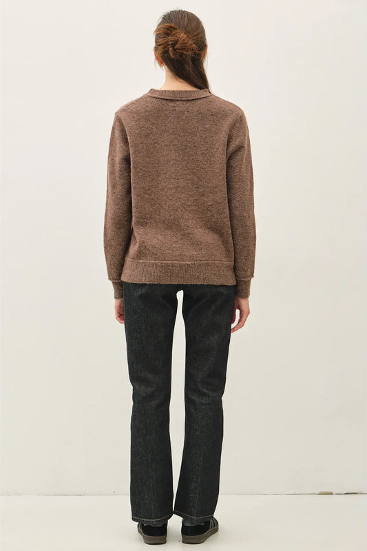 woman in sweater and jeans