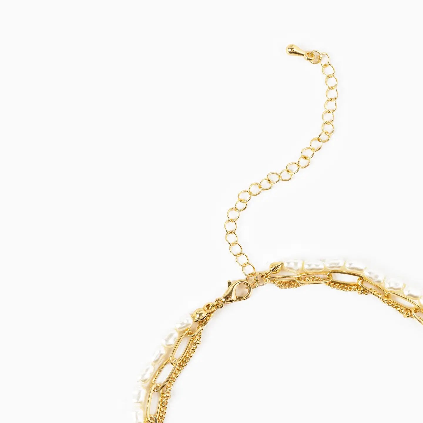 Gold bracelet on a white background