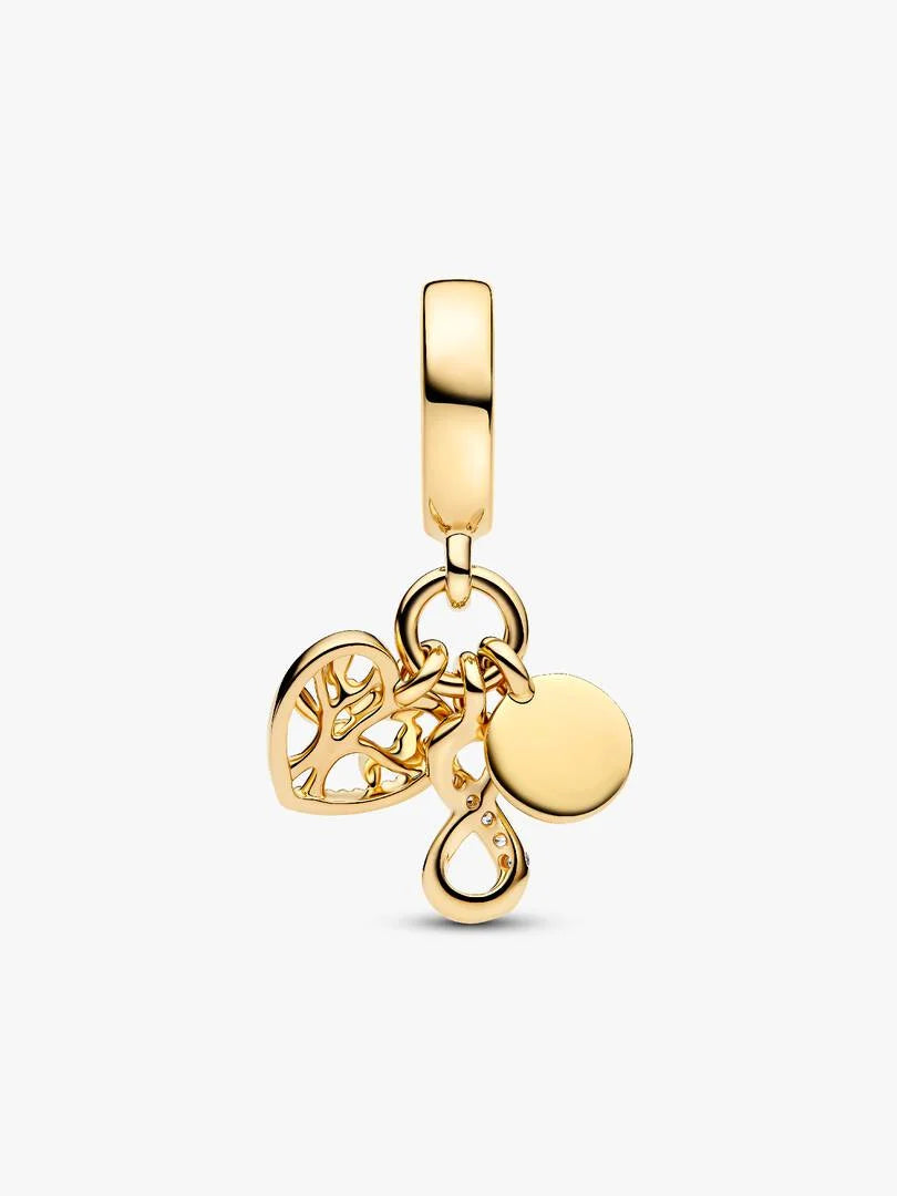 Gold charm with tree and round disc design on a white background