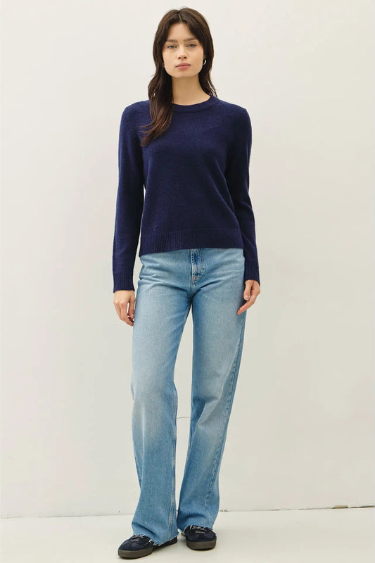 woman in blue sweater and jeans