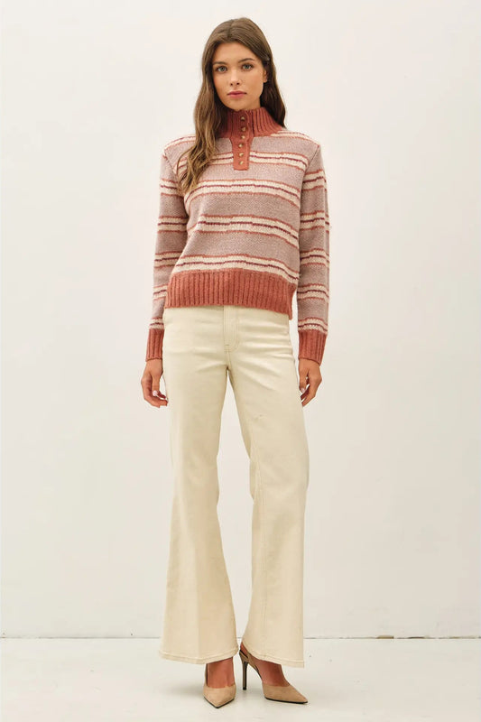 woman in button collar sweater and pants