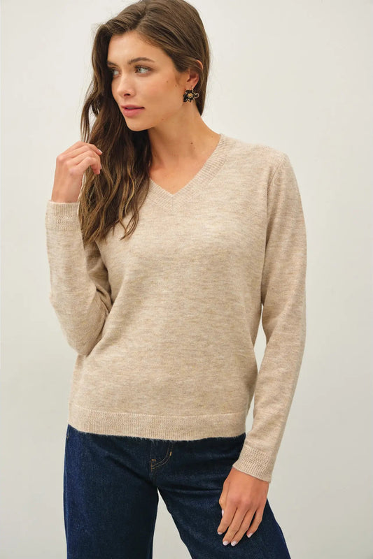 woman in sweater and jeans