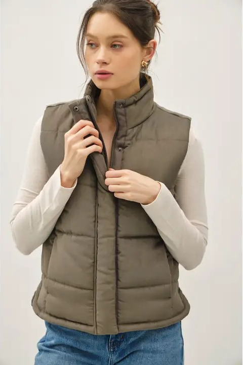 woman wearing puffer vest
