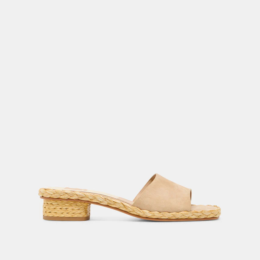 Beige sandal with woven strap on a white background