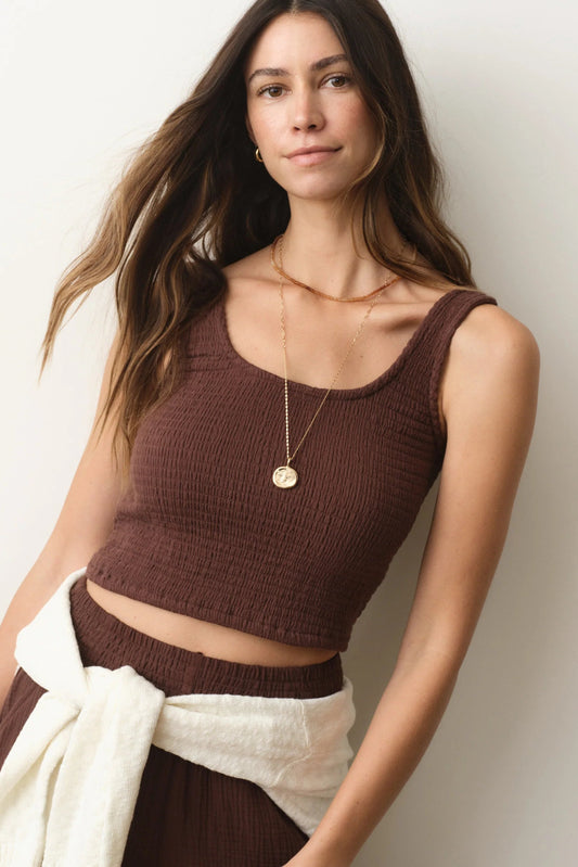woman wearing brown tank top