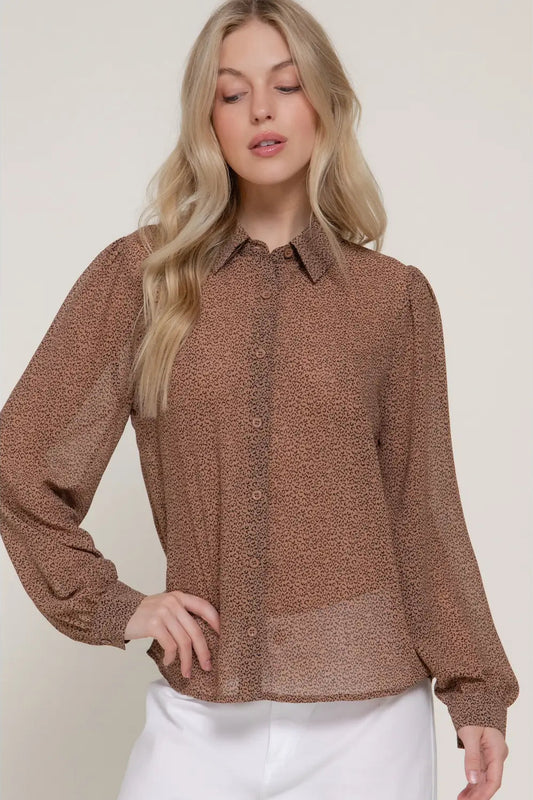 woman in printed blouse