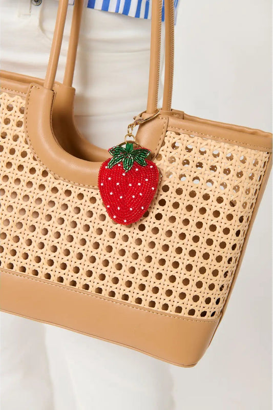 bag with beaded strawberry charm
