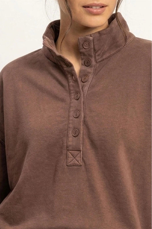 close up of button sweatshirt
