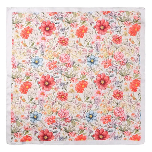 Floral patterned fabric with red, pink, and blue flowers on a white background