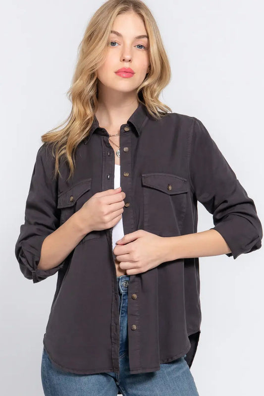 woman in button up shirt and jeans