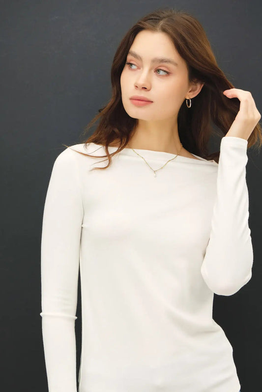 woman in long sleeve top