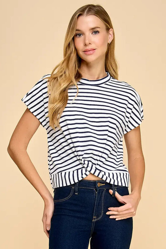 woman wearing stripe top with jeans