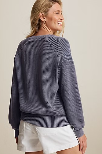 woman in blue sweater