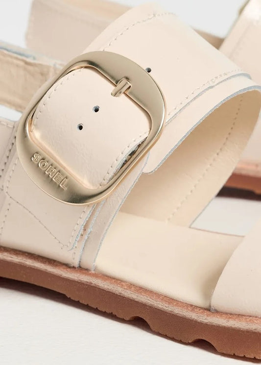Beige sandal with gold buckle on a white background