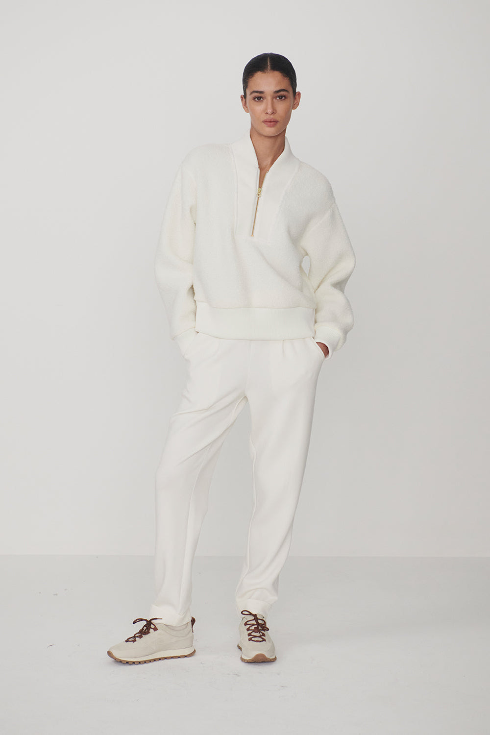woman wearing fleece sweatshirt and pants