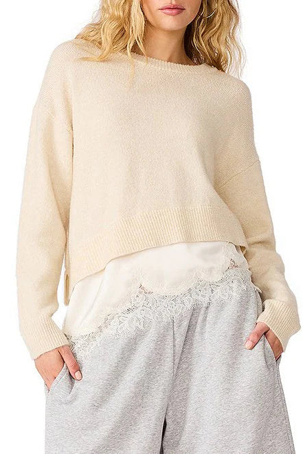 woman with cream sweater