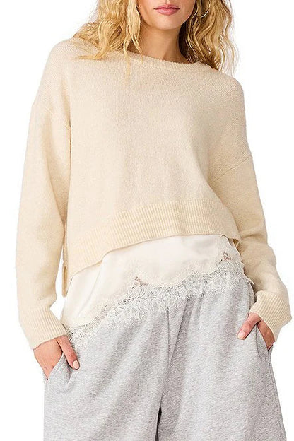 woman with cream sweater