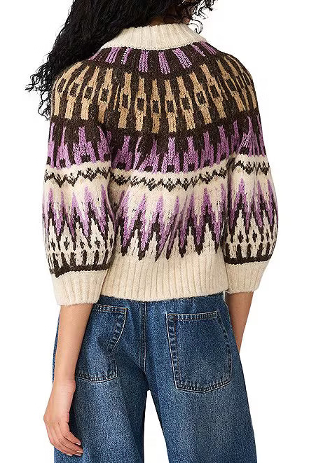 back view of woman in sweater