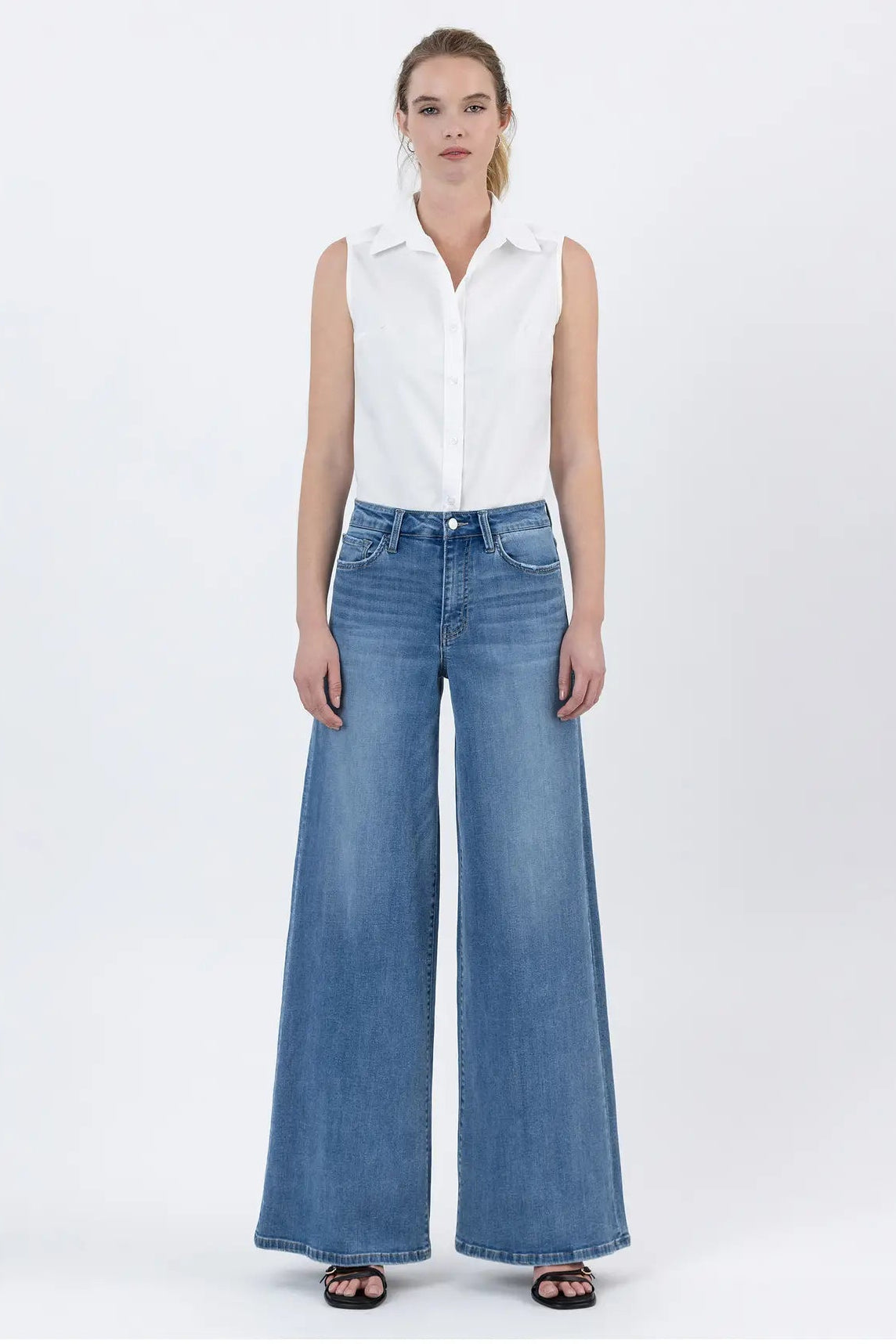 woman in top and jeans