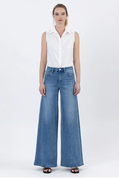 woman in top and jeans