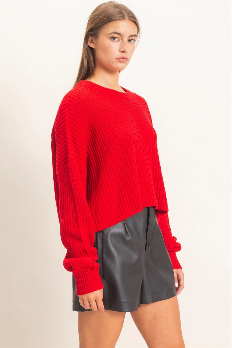woman wearing red cropped sweater