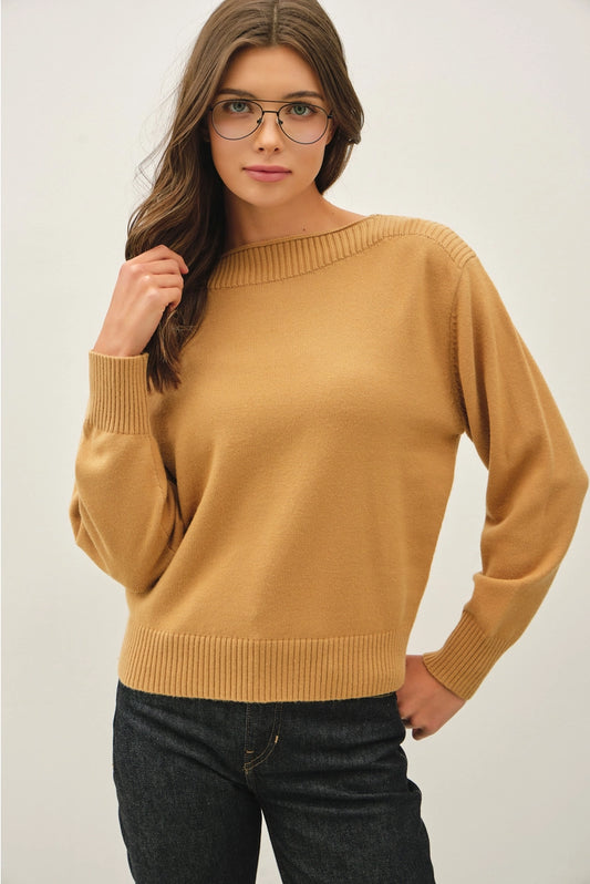 woman wearing yellow sweater