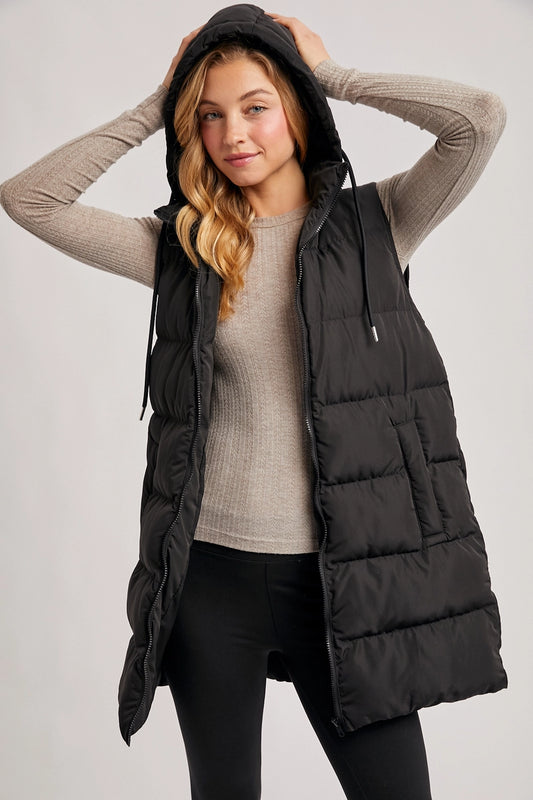 woman wearing puffer vest 
