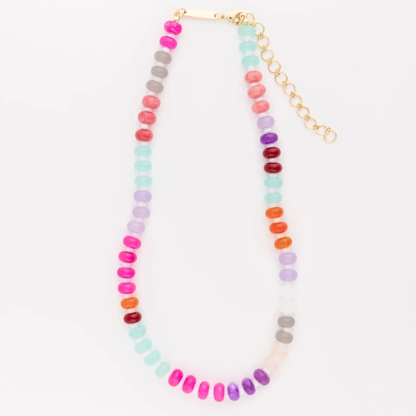 Necklace with multicolored beads on a white background