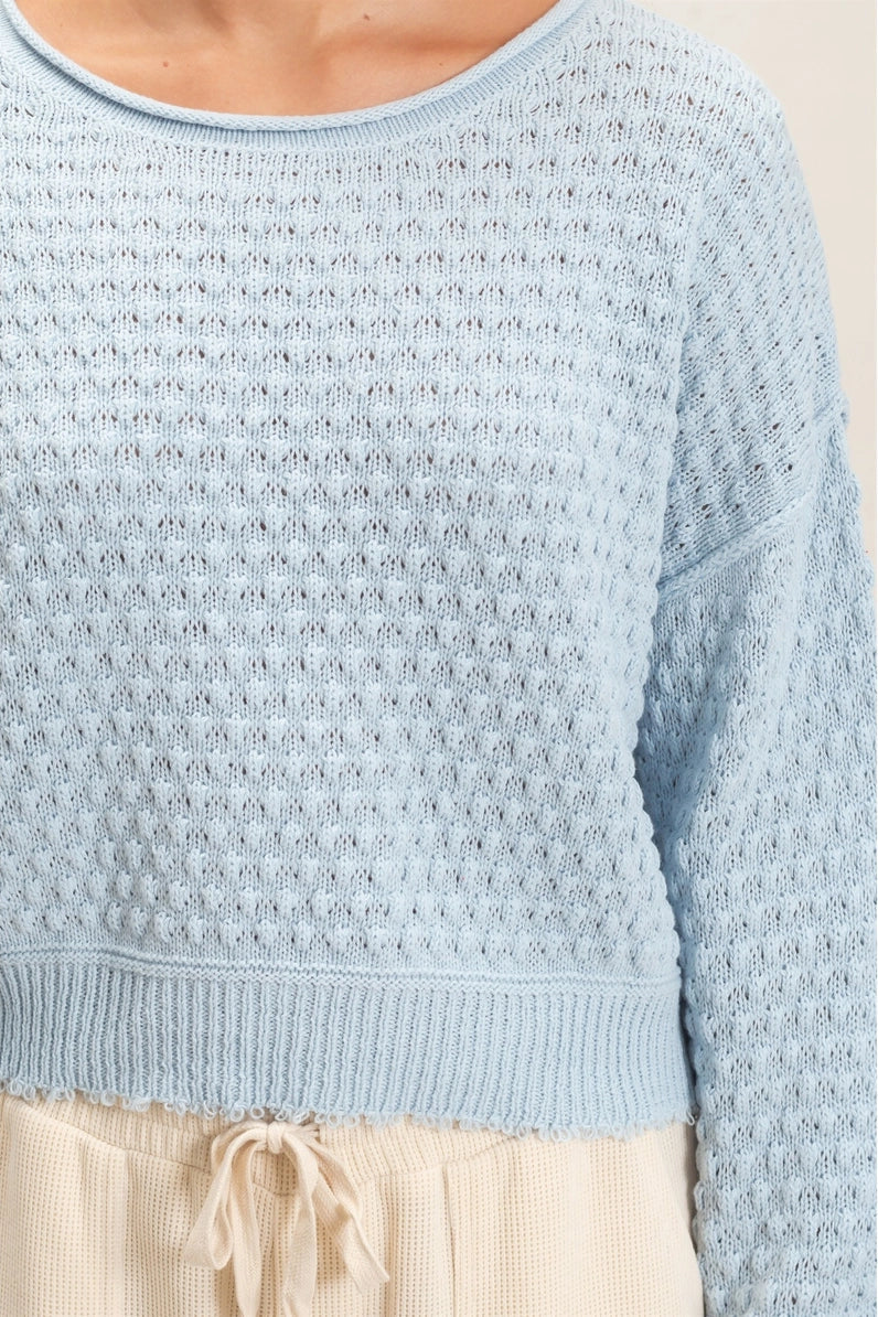 woman wearing blue sweater