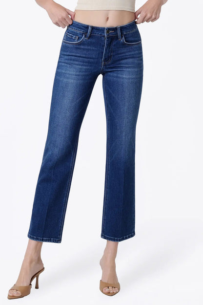 person in dark wash jeans