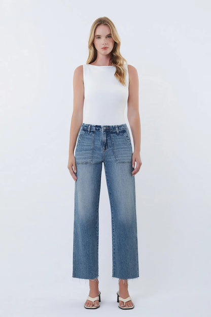 person in jeans and tank