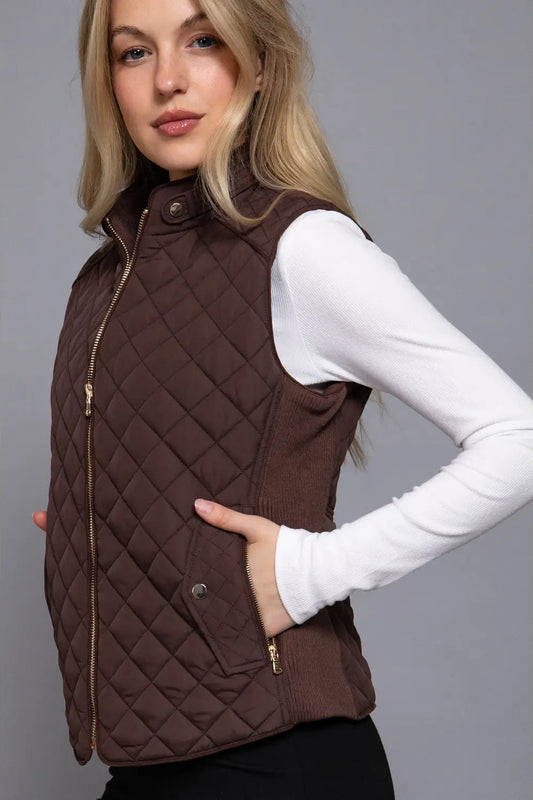 woman in quilted vest 