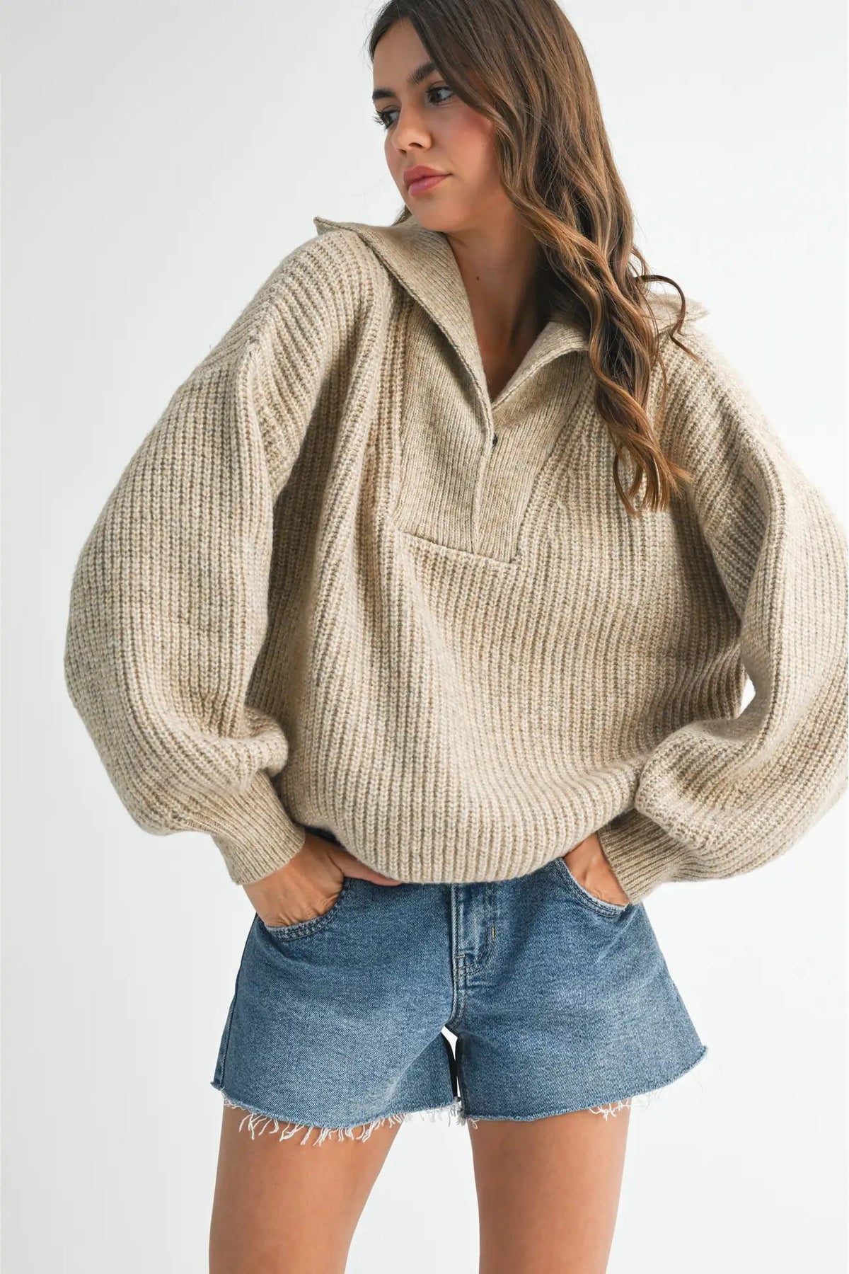 woman in henley sweater and shorts