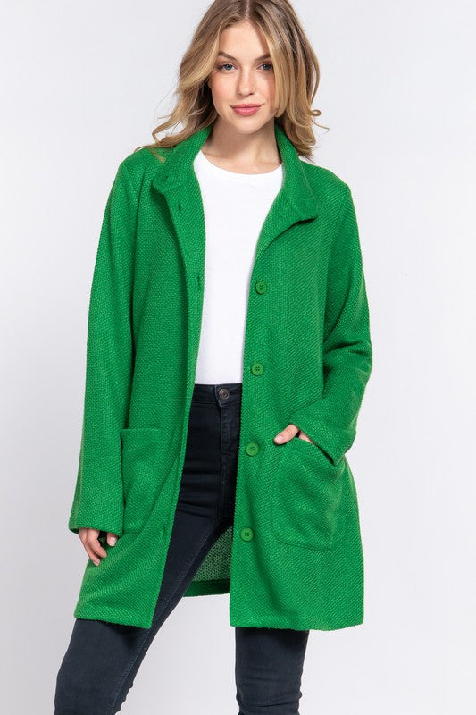 woman in green coat
