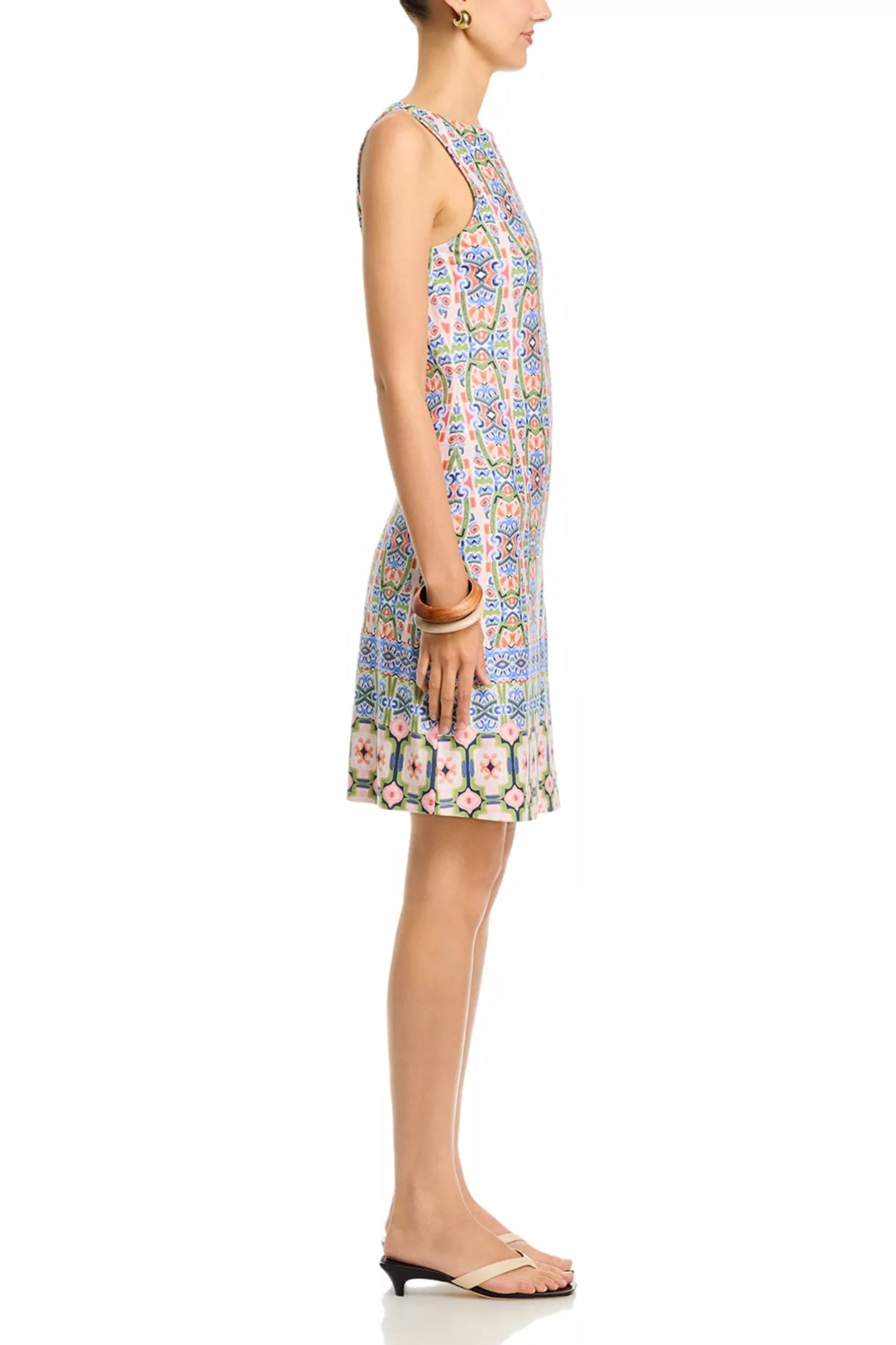 Woman wearing a floral dress on a white background