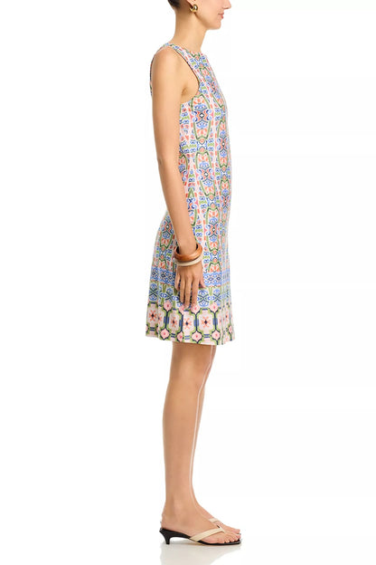 Woman wearing a floral dress on a white background