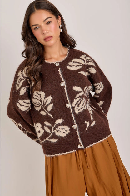 woman in floral cardi and skirt