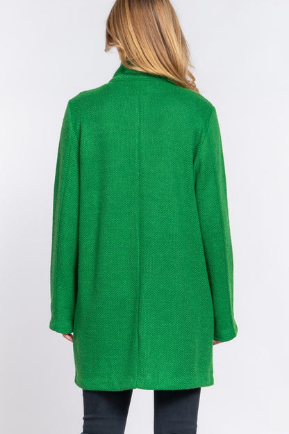 woman in green coat