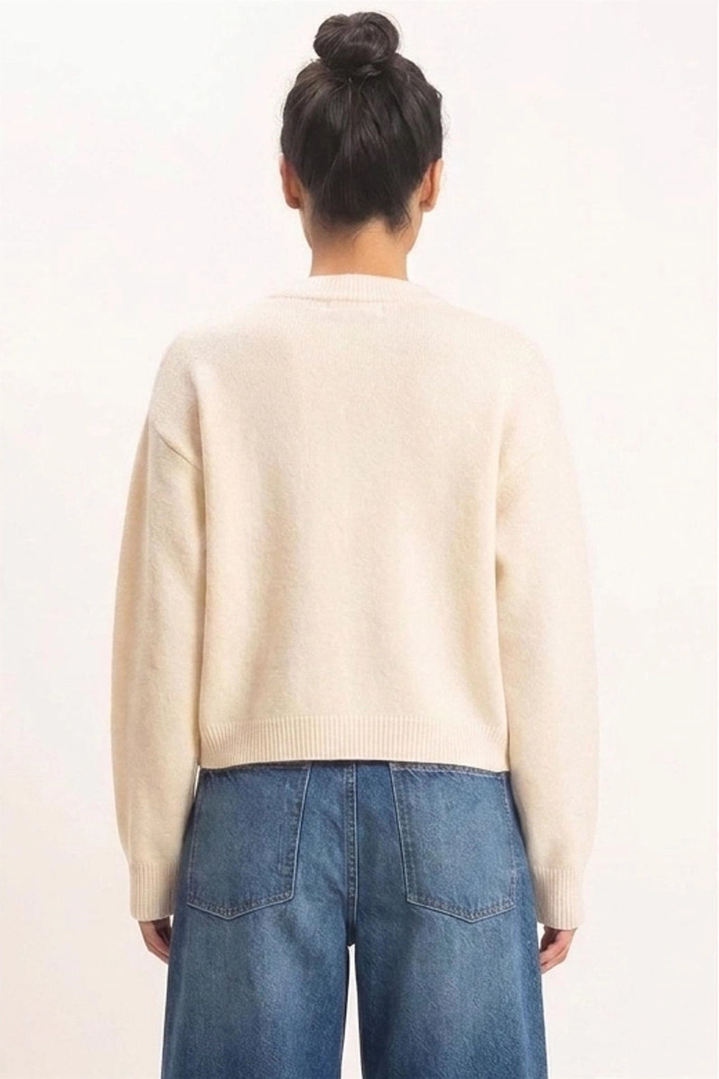woman in sweater