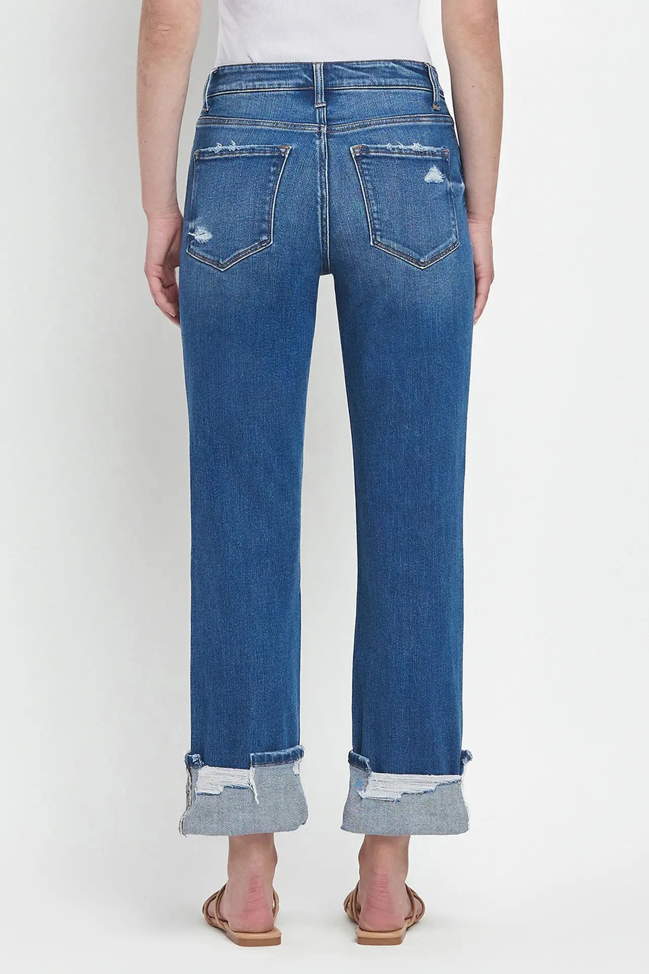 Blue jeans with a white background