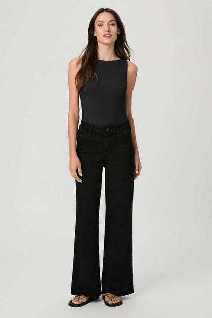 woman in black jeans and black tank