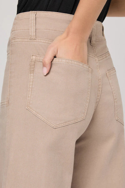 Beige pants with a plain background