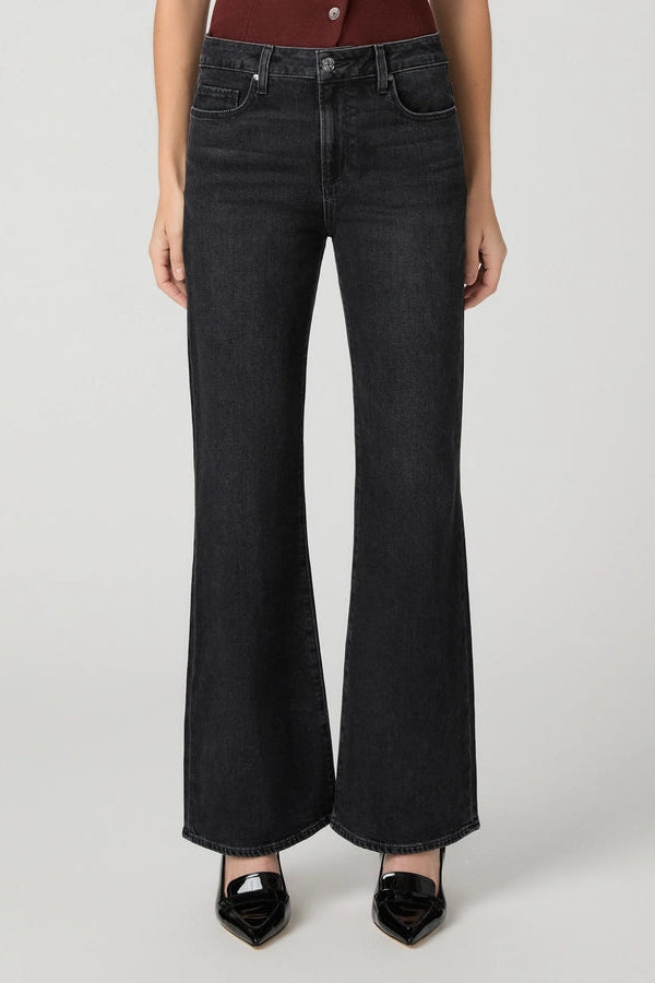 person wearing black jeans close up 