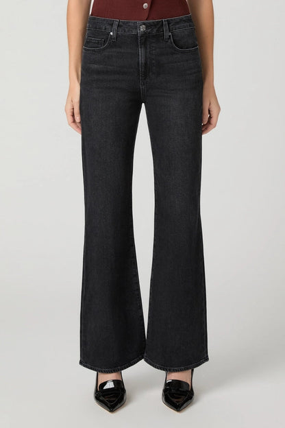 person wearing black jeans close up 